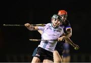 23 January 2025; Finn Hogan of Maynooth University in action against Billy Reid of DCU Dóchas Éireann during the Electric Ireland Higher Education GAA Fitzgibbon Cup round two match between Dublin City University DÉ and Maynooth University at the Dublin City University Sportsgrounds in Dublin. Photo by Thomas Flinkow/Sportsfile