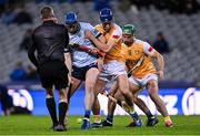 25 January 2025; Referee James Owens throws the ball in between Conor Burke of Dublin and Antrim's Scott Walsh and Nigel Elliot, right, to start the Allianz Hurling League Division 1B match between Dublin and Antrim at Croke Park in Dublin. Photo by Stephen McCarthy/Sportsfile