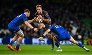 25 January 2025; Marcel Theunissen of DHL Stormers is tackled by Diarmuid Mangan and Charlie Tector of Leinster during the United Rugby Championship match between Leinster and DHL Stormers at the Aviva Stadium in Dublin. Photo by Tyler Miller/Sportsfile