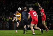 25 January 2025; Tyrone goalkeeper Niall Morgan attempts to kick a two-point score during the Allianz Football League Division 1 match between Tyrone and Derry at O'Neills Healy Park in Omagh, Tyrone. Photo by Ramsey Cardy/Sportsfile