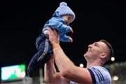 25 January 2025; John Hetherton of Dublin celebrates with his 1-year-old son Jack after the Allianz Hurling League Division 1B match between Dublin and Antrim at Croke Park in Dublin. Photo by Stephen McCarthy/Sportsfile