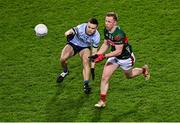 25 January 2025; Ryan O’Donoghue of Mayo in action against Eoin Murchan of Dublin during the Allianz Football League Division 1 match between Dublin and Mayo at Croke Park. Photo by Stephen McCarthy/Sportsfile