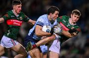 25 January 2025; James Madden of Dublin in action against Rory Brickenden, 3, and Davitt Neary of Mayo during the Allianz Football League Division 1 match between Dublin and Mayo at Croke Park. Photo by Ray McManus/Sportsfile