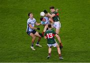 25 January 2025; Conor Reid and Fergal Boland, 13, of Mayo in action against James Madden, left, and Brian Howard of Dublin during the Allianz Football League Division 1 match between Dublin and Mayo at Croke Park. Photo by Stephen McCarthy/Sportsfile