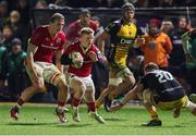 24 January 2025; Ethan Coughlan of Munster in action against George Young of Dragons during the United Rugby Championship match between Dragons and Munster at Rodney Parade in Newport, Wales. Photo by Gareth Everett/Sportsfile