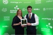 25 January 2025; Jack Fafferty from St Michael's Rowing Club Limerick is presented with the Junior Male Rower of the Year award by Dr Úna May CEO of Sport Ireland during Rowing Ireland's Olympic Celebration & Awards Night at Fota Island Resort in Cork. Photo by Matt Browne/Sportsfile