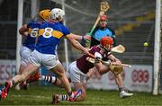 26 January 2025; Conor Whelan of Galway shoots wide under pressure from Ronan Maher, 6, and Michael Breen of Tipperary during the Allianz Hurling League Division 1A match between Galway and Tipperary at Pearse Stadium in Galway. Photo by Sam Barnes/Sportsfile