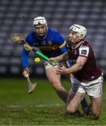 26 January 2025; Shane Cooney of Galway in action against Darragh McCarthy of Tipperary during the Allianz Hurling League Division 1A match between Galway and Tipperary at Pearse Stadium in Galway. Photo by Sam Barnes/Sportsfile