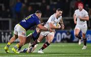 26 January 2025; John Cooney of Ulster is tackled by Muhamed Hasa and Luca Bigi of Zebre Parma during the United Rugby Championship match between Ulster and Zebre Parma at Kingspan Stadium in Belfast. Photo by Ramsey Cardy/Sportsfile