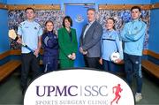 29 January 2025; UPMC has been unveiled as the official healthcare partner of Dublin GAA during an event at Parnell Park, Dublin. Pictured at the announcement are UPMC Managing Director Eamonn Fitzgerald and UPMC Sports Surgery Clinic Santry General Manager Fiona Roche, with Dublin players from left, hurler Darragh Power, camogie player Zoe Couch, ladies footballer Niamh Donlon and footballer David Byrne. Photo by Sam Barnes/Sportsfile