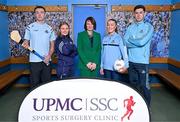 29 January 2025; UPMC has been unveiled as the official healthcare partner of Dublin GAA during an event at Parnell Park, Dublin. Pictured at the announcement is UPMC Sports Surgery Clinic Santry General Manager Fiona Roche, with Dublin players from left, hurler Darragh Power, camogie player Zoe Couch, ladies footballer Niamh Donlon and footballer David Byrne. Photo by Sam Barnes/Sportsfile