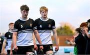 29 January 2025; Newbridge College captain Daniel Cox, left, and team-mate Conor Hanly leave the pitch after their side's defeat in the Bank of Ireland Leinster Rugby Boys Schools Senior Cup first round match between Newbridge College and Gonzaga College at Energia Park in Dublin. Photo by Shauna Clinton/Sportsfile