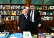 30 January 2025; Republic of Ireland captain Séamus Coleman with the President of Ireland Michael D. Higgins after receiving a Presidential Distinguished Service Award for the Irish Abroad at Áras an Uachtaráin in Dublin. The Awards recognise the service given to this country or to Irish communities abroad by those who live outside Ireland. Photo by Stephen McCarthy/Sportsfile