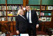 30 January 2025; Republic of Ireland captain Séamus Coleman with the President of Ireland Michael D. Higgins after receiving a Presidential Distinguished Service Award for the Irish Abroad at Áras an Uachtaráin in Dublin. The Awards recognise the service given to this country or to Irish communities abroad by those who live outside Ireland. Photo by Stephen McCarthy/Sportsfile