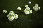 31 January 2025; A general view of footballs on the pitch for the Drogheda United warm-up before the Jim Malone Cup match between Dundalk and Drogheda United at Oriel Park in Dundalk, Louth. Photo by Piaras Ó Mídheach/Sportsfile