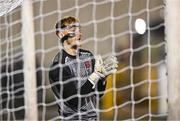 31 January 2025; Dundalk goalkeeper Enda Minogue, wearing a protective facemask, in the warm-up before the Jim Malone Cup match between Dundalk and Drogheda United at Oriel Park in Dundalk, Louth. Photo by Piaras Ó Mídheach/Sportsfile