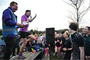 1 February 2025; Vhi ambassador and Olympian David Gillick leads the warm up at the Marlay Park parkrun at Marlay Park in Dublin where Vhi hosted a special event to welcome parkrun founder Paul Sinton-Hewitt. Vhi ambassador and Olympian David Gillick was on hand to deliver a warm-up for all participants. parkrun in partnership with Vhi support local communities in organising free, weekly, timed 5km runs every Saturday at 9.30am. To register for a parkrun near you visit www.parkrun.ie. Photo by David Fitzgerald/Sportsfile
