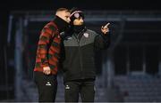 31 January 2025; Derry City manager Tiernan Lynch and coach Andy Mitchell, left, during the pre-season friendly match between Derry City and Ballymena United at the Ryan McBride Brandywell Stadium in Derry. Photo by Stephen McCarthy/Sportsfile