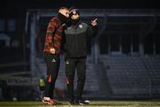 31 January 2025; Derry City manager Tiernan Lynch and coach Andy Mitchell, left, during the pre-season friendly match between Derry City and Ballymena United at the Ryan McBride Brandywell Stadium in Derry. Photo by Stephen McCarthy/Sportsfile