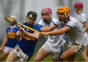 1 February 2025; Cillian Minogue of Thurles CBS in action against Robert Loftus of St Flannans Ennis during the Dr Harty Cup final match between Thurles CBS and St Flannans Ennis at Mallow GAA Complex in Cork.  Photo by John Sheridan/Sportsfile