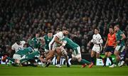 1 February 2025; Ellis Genge of England is tackled by Ireland players, from left, Caelan Doris, Andrew Porter and James Ryan during the Guinness Six Nations Rugby Championship match between Ireland and England at Aviva Stadium in Dublin. Photo by Sam Barnes/Sportsfile
