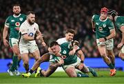 1 February 2025; Andrew Porter of Ireland is tackled by Henry Slade of England during the Guinness Six Nations Rugby Championship match between Ireland and England at Aviva Stadium in Dublin. Photo by Ramsey Cardy/Sportsfile