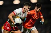 1 February 2025; Michael McKernan of Tyrone in action against Darragh McCullen of Armagh during the Allianz Football League Division 1 match between Armagh and Tyrone at BOX-IT Athletic Grounds in Armagh. Photo by Ben McShane/Sportsfile