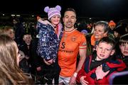 1 February 2025; Aidan Forker of Armagh celebrates with one his students from Our Lady's Tullysaran school and Armagh supporter Rebecca Terris, age 7, after the Allianz Football League Division 1 match between Armagh and Tyrone at BOX-IT Athletic Grounds in Armagh. Photo by Ben McShane/Sportsfile
