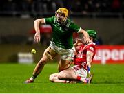 1 February 2025; Adam English of Limerick in action against Cormac O'Brien of Cork during the Allianz Hurling League Division 1A match between Cork and Limerick at SuperValu Páirc Uí Chaoimh in Cork. Photo by Piaras Ó Mídheach/Sportsfile
