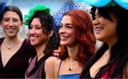 2 February 2025; Racegoers, including Andrea Alario, centre, from Madrid in Spain, during day two of the Dublin Racing Festival at Leopardstown Racecourse in Dublin. Photo by Shauna Clinton/Sportsfile