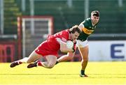 2 February 2025; Donncha Gilmore of Derry is tackled by Dylan Geaney of Kerry during the Allianz Football League Division 1 match between Derry and Kerry at Celtic Park in Derry. Photo by Stephen McCarthy/Sportsfile