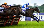 2 February 2025; Kimy, with Jake Coen up, right, who finished second, jump the last in The Irish Stallion Farms EBF Paddy And Maureen Mullins Mares Handicap Hurdle during day two of the Dublin Racing Festival at Leopardstown Racecourse in Dublin. Photo by Shauna Clinton/Sportsfile