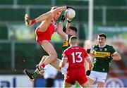 2 February 2025; Anton Tohill of Derry and Diarmuid O'Connor of Kerry during the Allianz Football League Division 1 match between Derry and Kerry at Celtic Park in Derry. Photo by Stephen McCarthy/Sportsfile