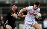2 February 2025; Sean McDonnell of Cork in action against Peter Fegan of Down during the Allianz Football League Division 2 match between Down and Cork at Páirc Esler in Newry, Down. Photo by Ramsey Cardy/Sportsfile