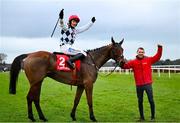 2 February 2025; Paul Townend celebrates on Ballyburn, along with groom Dónal Redmond, after winning The Ladbrokes Novice Steeplechase during day two of the Dublin Racing Festival at Leopardstown Racecourse in Dublin. Photo by Shauna Clinton/Sportsfile