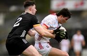 2 February 2025; Chris Og Jones of Cork in action against Peter Fegan of Down during the Allianz Football League Division 2 match between Down and Cork at Páirc Esler in Newry, Down. Photo by Ramsey Cardy/Sportsfile
