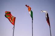 2 February 2025; Flags, from left, of Mayo, the Irish tricolour, and Galway flying in the stadium before the Allianz Football League Division 1 match between Mayo and Galway at Hastings Insurance MacHale Park in Castlebar, Mayo. Photo by Piaras Ó Mídheach/Sportsfile