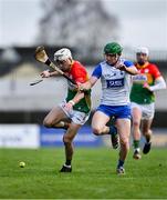 2 February 2025; Conor Kehoe of Carlow in action against Tom Barron of Waterford during the Allianz Hurling League Division 1B match between Carlow and Waterford at Netwatch Cullen Park in Carlow. Photo by Stephen Marken/Sportsfile
