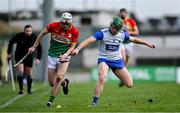 2 February 2025; Conor Kehoe of Carlow in action against Tom Barron of Waterford during the Allianz Hurling League Division 1B match between Carlow and Waterford at Netwatch Cullen Park in Carlow. Photo by Stephen Marken/Sportsfile