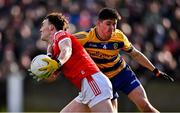 2 February 2025; Sean Reynolds of Louth in action against Niall Higgins of Roscommon during the Allianz Football League Division 2 match between Louth and Roscommon at Integral GAA Grounds in Drogheda, Louth. Photo by Ben McShane/Sportsfile