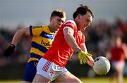2 February 2025; Sean Reynolds of Louth in action against Pearse Frost of Roscommon during the Allianz Football League Division 2 match between Louth and Roscommon at Integral GAA Grounds in Drogheda, Louth. Photo by Ben McShane/Sportsfile