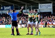 2 February 2025; Kerry players, from left, Seán O'Shea, Jason Foley and Tadhg Morley appeal to referee Martin McNally during the Allianz Football League Division 1 match between Derry and Kerry at Celtic Park in Derry. Photo by Stephen McCarthy/Sportsfile