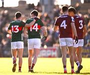 2 February 2025; Mayo players Paul Towey, 13, and Frank Irwin  and Galway players Daniel O'Flaherty, 4, and Seán Fitzgerald pair-up for in-game chats during the Allianz Football League Division 1 match between Mayo and Galway at Hastings Insurance MacHale Park in Castlebar, Mayo. Photo by Piaras Ó Mídheach/Sportsfile