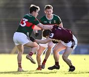 2 February 2025; Johnny McGrath of Galway in action against Paul Towey, left, and David McBrien of Mayo during the Allianz Football League Division 1 match between Mayo and Galway at Hastings Insurance MacHale Park in Castlebar, Mayo. Photo by Piaras Ó Mídheach/Sportsfile