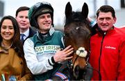 2 February 2025; Solness, centre, jockey Danny Mullins, groom Shane Byrne and winning connections after they won The Ladbrokes Dublin Steeplechaseon Solness during day two of the Dublin Racing Festival at Leopardstown Racecourse in Dublin. Photo by Shauna Clinton/Sportsfile