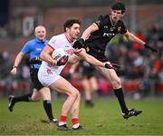 2 February 2025; Paul Walsh of Cork in action against Eugene Branagan of Down during the Allianz Football League Division 2 match between Down and Cork at Páirc Esler in Newry, Down. Photo by Ramsey Cardy/Sportsfile