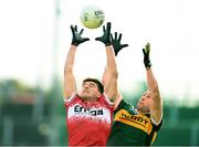 2 February 2025; Conor Doherty of Derry and Paul Geaney of Kerry during the Allianz Football League Division 1 match between Derry and Kerry at Celtic Park in Derry. Photo by Stephen McCarthy/Sportsfile