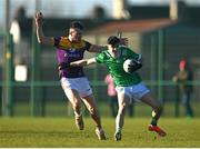 2 February 2025; Andrew Meade of Limerick is tackled by Tom Byrne of Wexford during the Allianz Football League Division 4 match between Limerick and Wexford at Mick Neville Park in Rathkeale, Limerick. Photo by Tom Beary/Sportsfile