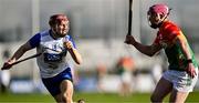 2 February 2025; Patrick Fitzgerald of Waterford in action against Dion Wall of Carlow during the Allianz Hurling League Division 1B match between Carlow and Waterford at Netwatch Cullen Park in Carlow. Photo by Stephen Marken/Sportsfile