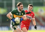 2 February 2025; Paudie Clifford of Kerry and Mark Doherty of Derry during the Allianz Football League Division 1 match between Derry and Kerry at Celtic Park in Derry. Photo by Stephen McCarthy/Sportsfile